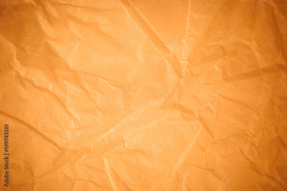 Fototapeta premium Brown crumpled paper background.
