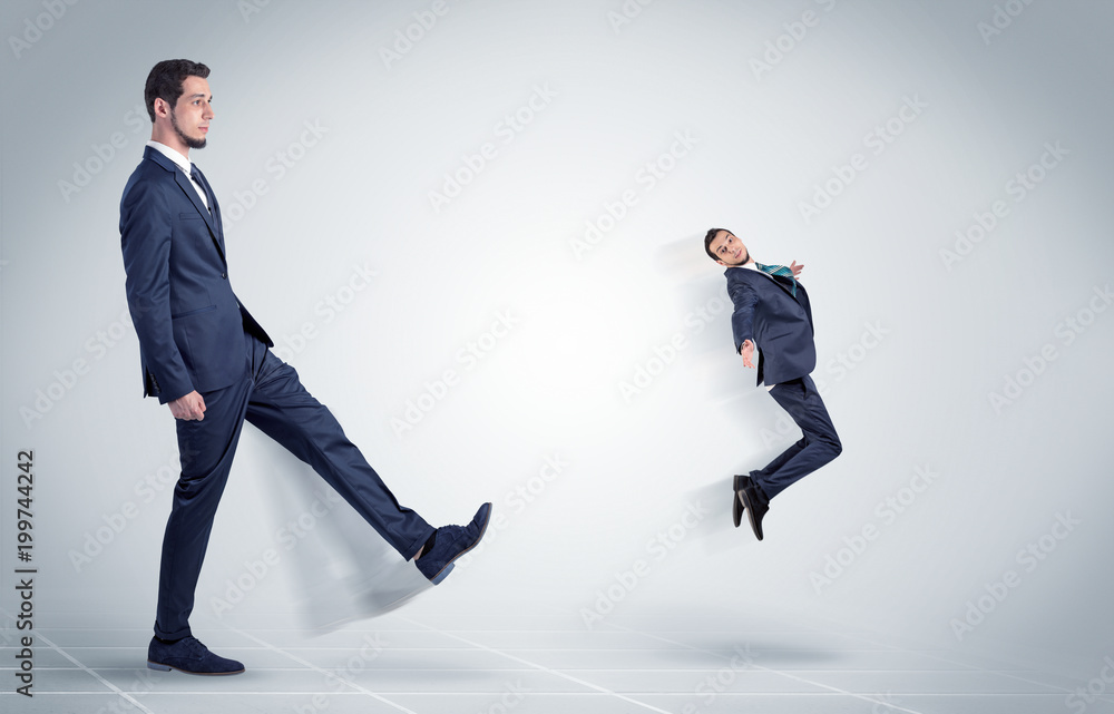 Young businessman fired cruel and aggressive by his boss with white background
Young businessman fired cruel and aggressive by his boss with white background