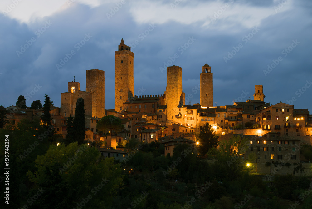 Medieval towers of the town of San Gimignano in the September twilight. Italy