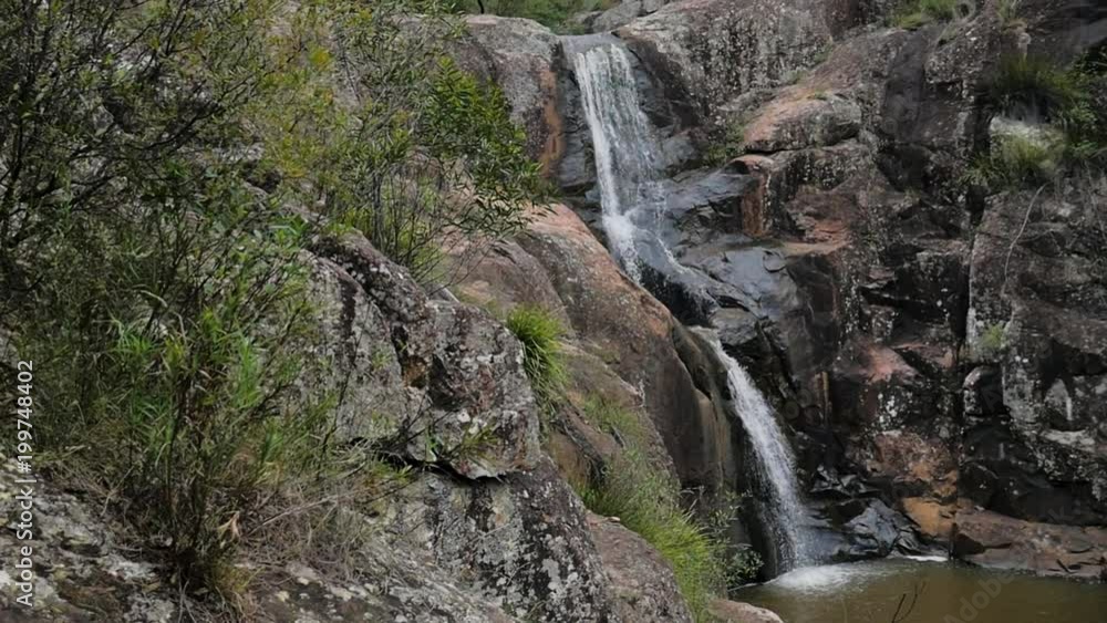 60 Foot Falls Waterfall Wide Shot Pan Slow Motion 60 Foot Falls Waterfall Wide Shot Pan Slow Motion