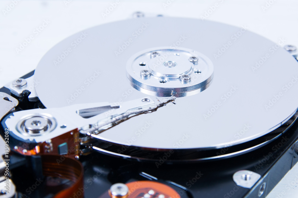 Open computer hard disk drive (HDD) closeup Open computer hard disk drive (HDD) closeup