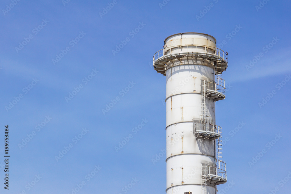 Pipes of industrial factory and blue sky background Pipes of industrial factory and blue sky background
