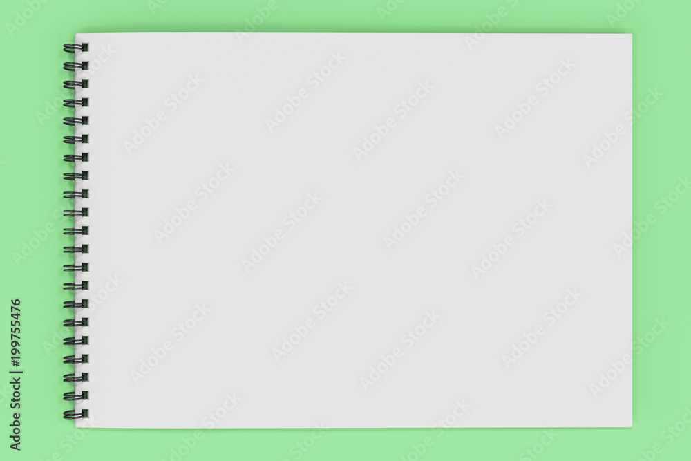 Blank white notebook with black spiral bound on green background Blank white notebook with black spiral bound on green background