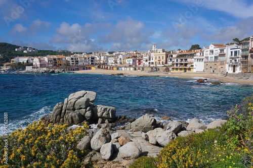 Spain coastline of the Mediterranean village Calella de Palafrugell with sandy beach and rocks, Costa Brava, Catalonia, Baix Emporda