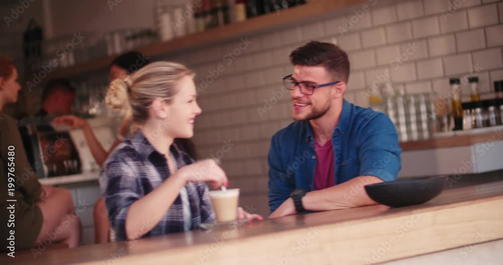 Young hipster friends having fun in urban coffee shop Young hipster friends having fun in urban coffee shop