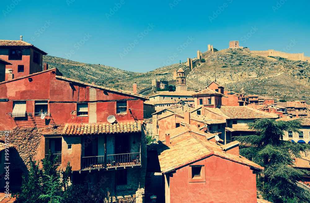 medieval street with old fortress wall in Albarracin