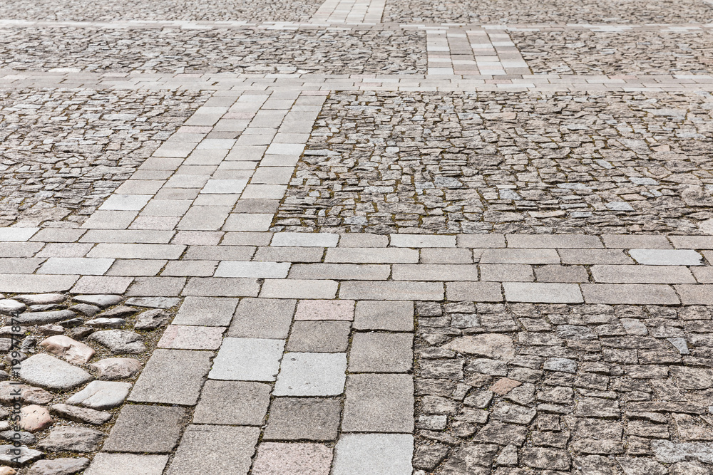 closeup of a cobblestones pattern floor, background made of a cobblestones pattern