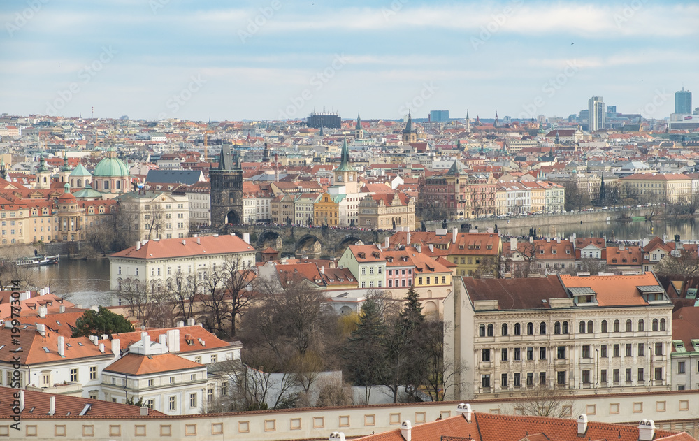 views of the city of Prague from the City Castle with the famous Charles Bridge in the center, Czech Republic