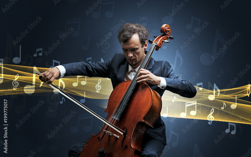Fototapeta premium Young male musician playing on his cello with musical notes around