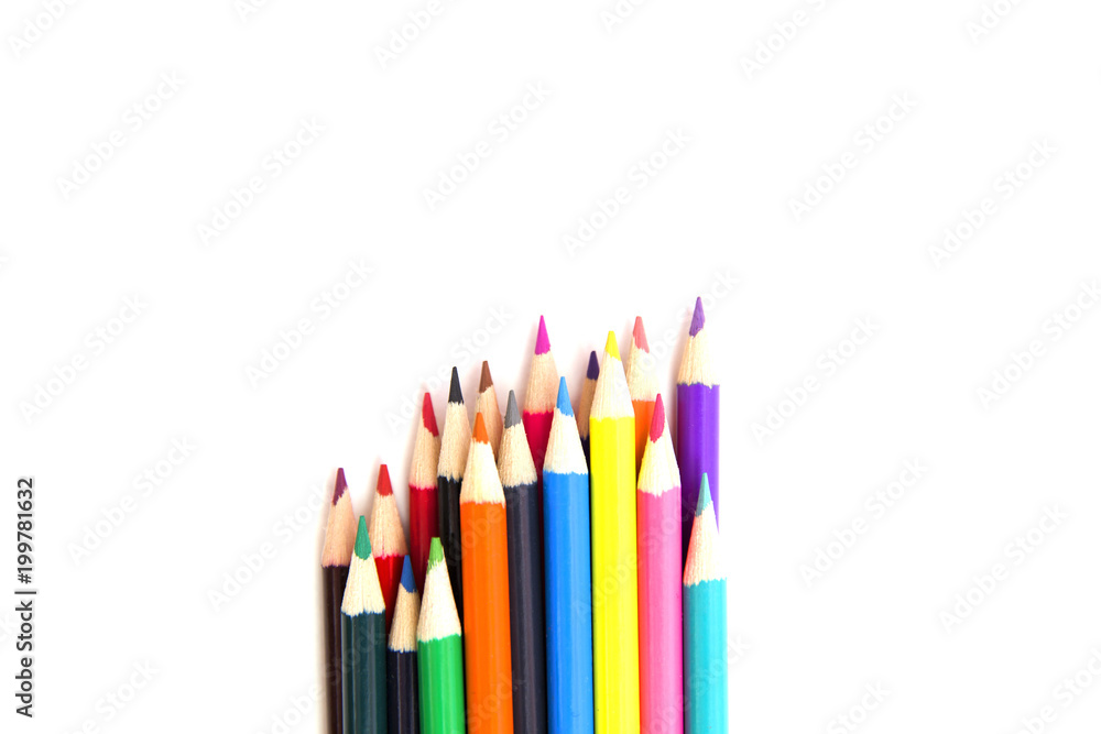 Multicolored pensils on the white paper. Multicolored pensils on the white paper.