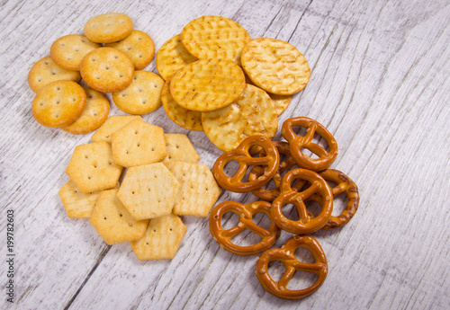 Mix of snacks : pretzels, crackers, cookies.