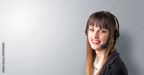 Young female telemarketer on a white background