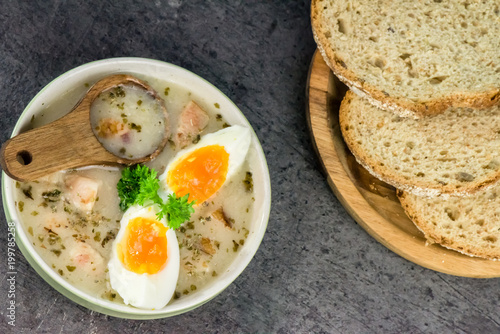 Zurek - polish Easter soup with eggs and white sausage - closeup