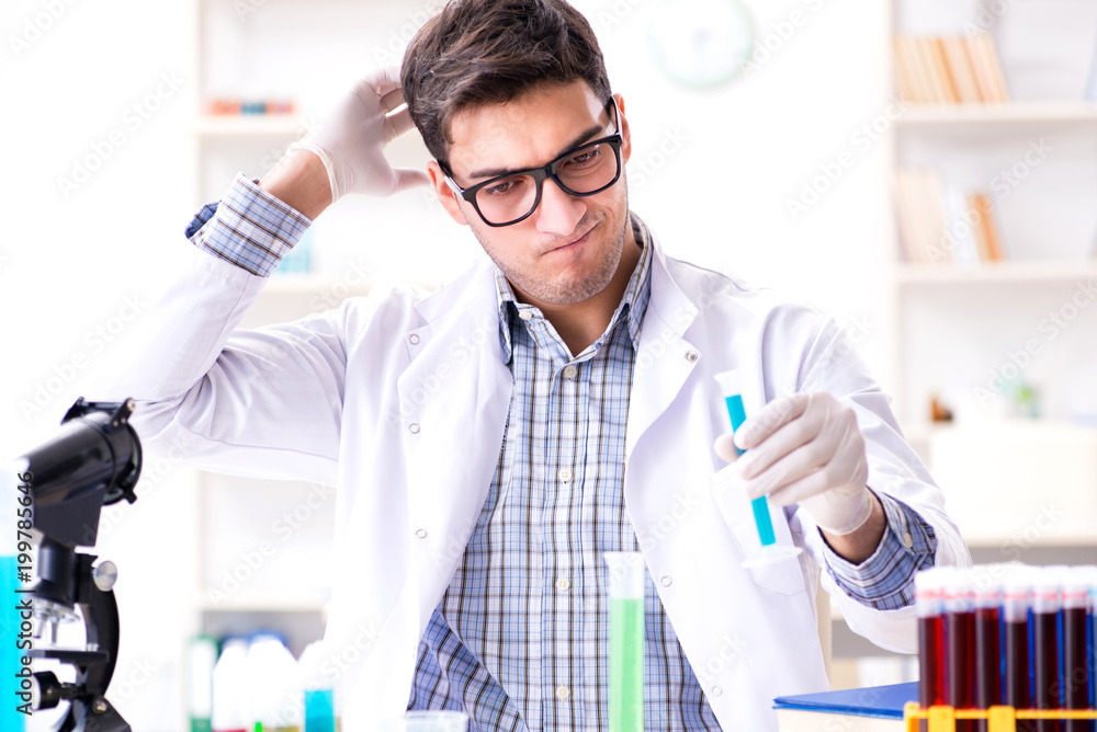 Chemistry student doing chemical experiments at classroom activi Chemistry student doing chemical experiments at classroom activi
