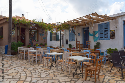 Typical greek restaurant on a sunny summer day at Keri village, Zakynthos island, Greece.