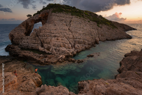 Landscape view of rocky formations Korakonisi in Zakynthos, Greece.Beautiful summer sunset, magnificent seascape.