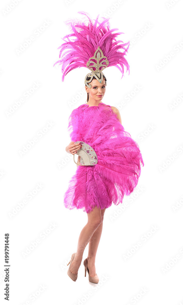 Beautiful girl in carnival costume with rhinestones and pink feathers on white background. Beautiful girl in carnival costume with rhinestones and pink feathers on white background.