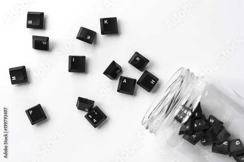 Keys of keyboard with glass jar