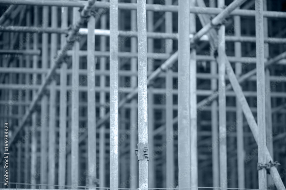 Scaffolding is on the construction site. Scaffolding is on the construction site.