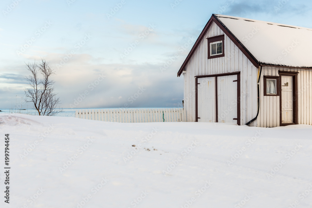 White wooden house in the village of Å on Lofoten, Norway White wooden house in the village of Å on Lofoten, Norway