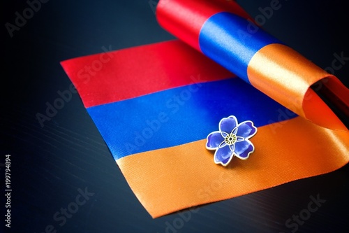 Forget-me-not- symbol of centennial of Armenian Genocide in Ottoman Empire- and flag of Armenia. Day of Remembrance of Victims of announced on April 24