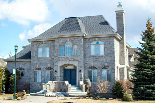 Photography Luxury house in Montreal, Canada against blue sky