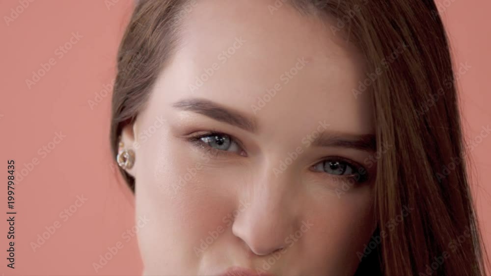 closeup of young model having fun and making faces, quaver, play the ape to a camera Closeup portrait closeup of young model having fun and making faces, quaver, play the ape to a camera Closeup portrait