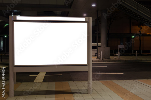 blank advertising billboard or light box with copy space for your text message or media and content in bus stop on street, information board, banner, marketing and advertising concept