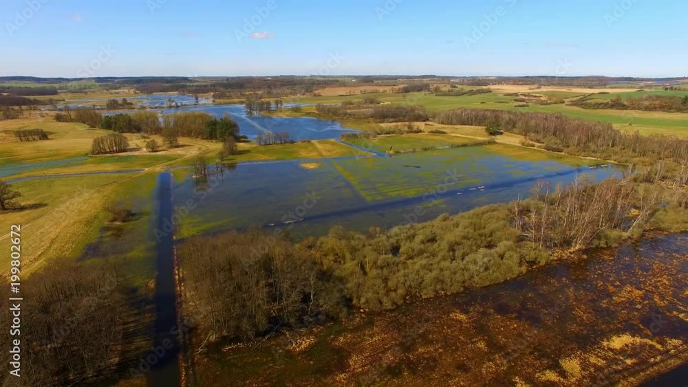 Aerial Flight view over flooded agricultural fields and meadows after rain and heavy storm in germany - 4K UHD
Aerial Flight view over flooded agricultural fields and meadows after rain and heavy storm in germany - 4K UHD