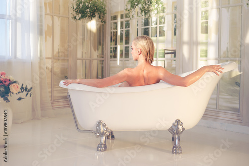 Beautiful nude sexy woman in the bath