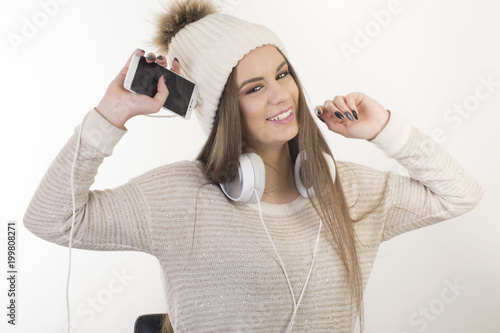 A young girl with headphones
