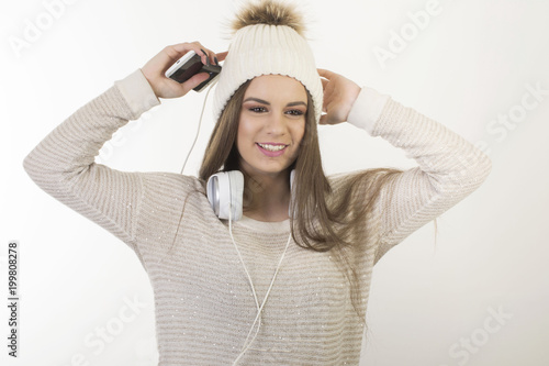 A young girl with headphones