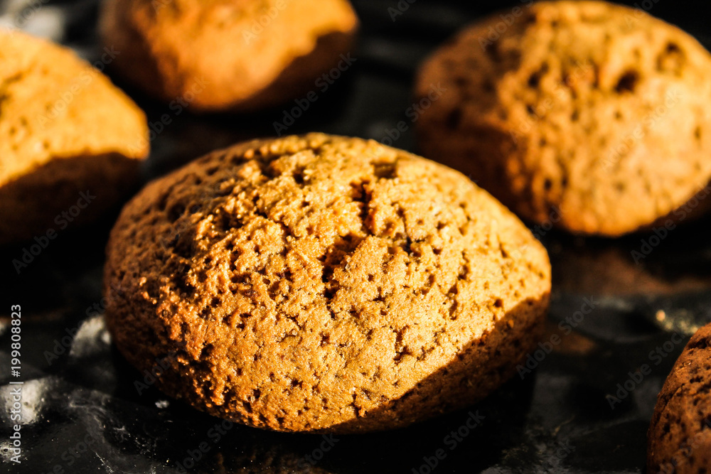 Fototapeta premium Cookies on a baking sheet in the oven