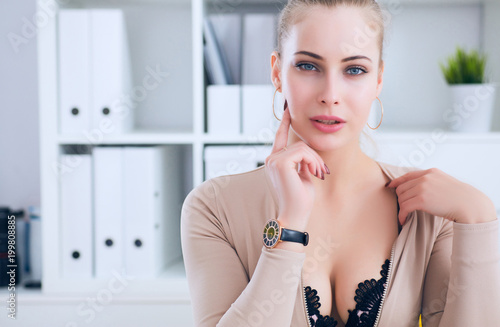 Sexy secretary undresses in office, flirt and desire. Office provocation.
