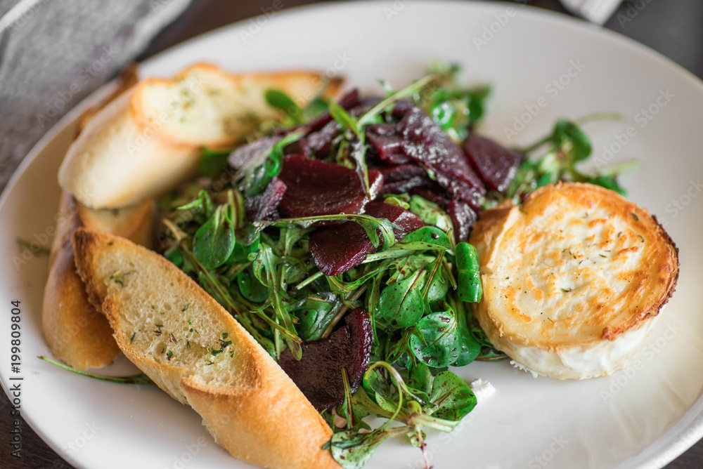 Green slad with beetroot and goat cheese. Green slad with beetroot and goat cheese.