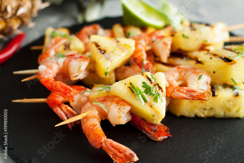 Grilled shrimp skewers with pineapple