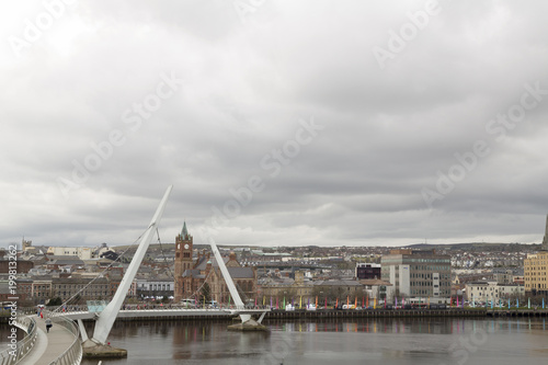 The Peace Bridge over the river Foyle and Guildhall  Derry Londonderry  Northern Ireland