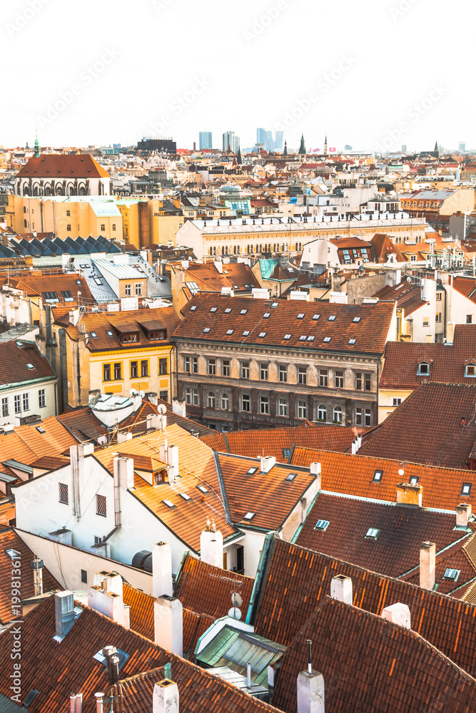 Panorama of the city of Prague. The old part of the city. Beautiful roofs of shingles. Ancient buildings and churches.
