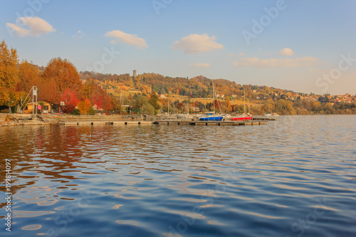 view of the lake of viverone in italy/Lake Viverone is the third largest lake in Piedmont in Italy , It is a lake of glacial origin,and an important fish and tourist resource