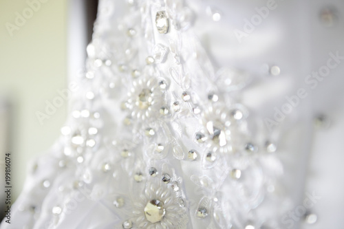 White wedding dress, decorated with rhinestones.