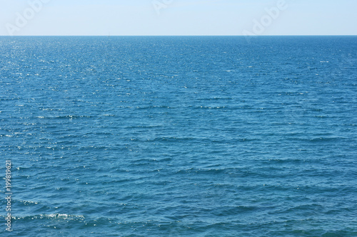 Blue calm Mediterranean Sea. Texture for the background.