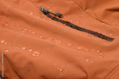 Obraz na płótnie Water repellent coating durable repellency fabric outdoor shell jacket with water drops. Waterproof membrane with droplets. w salonie