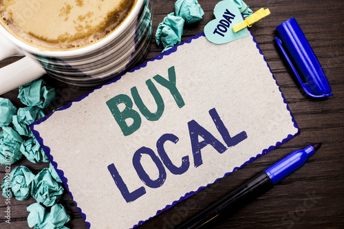 Conceptual hand writing showing Buy Local. Business photo showcasing Buying Purchase Locally Shop Store Market Buylocal Retailers written Cardboard Piece on wooden background Today Pen Coffee. photo