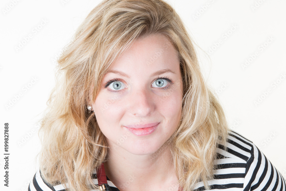Studio portrait of a beautiful blond young blue eyes woman closeup shot Studio portrait of a beautiful blond young blue eyes woman closeup shot