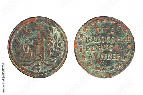 Two side of old brass Italian baiocchi coin from Perugia republic isolated on white.