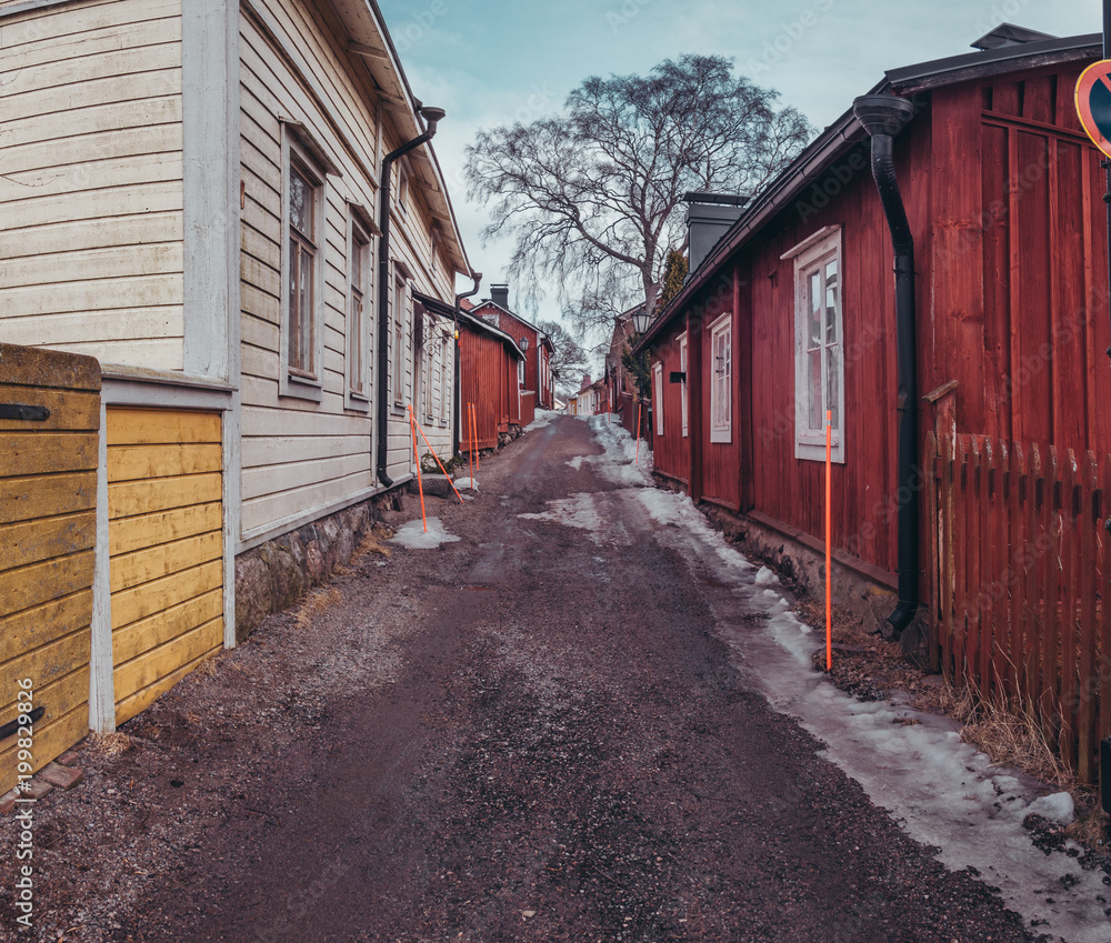 Narrow street with old wooden houses Raasepori Tammisaari Finland Narrow street with old wooden houses Raasepori Tammisaari Finland