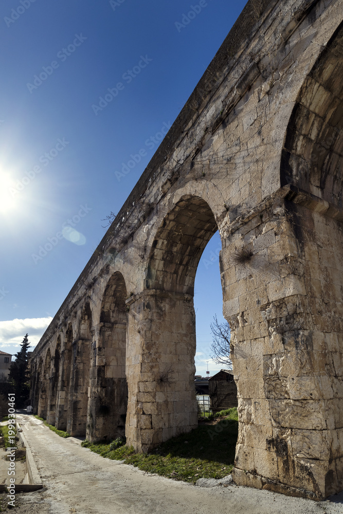 Ancient Roman Aqueduct, near Town Split in Croatia constructed during the Roman Empire to supply water to the Palace of Emperor Diocletian Ancient Roman Aqueduct, near Town Split in Croatia constructed during the Roman Empire to supply water to the Palace of Emperor Diocletian