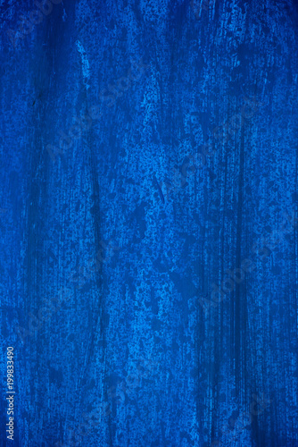 Dark blue and blue background smeared with brushes.