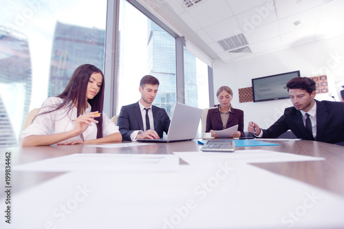 Business people working together at a meeting