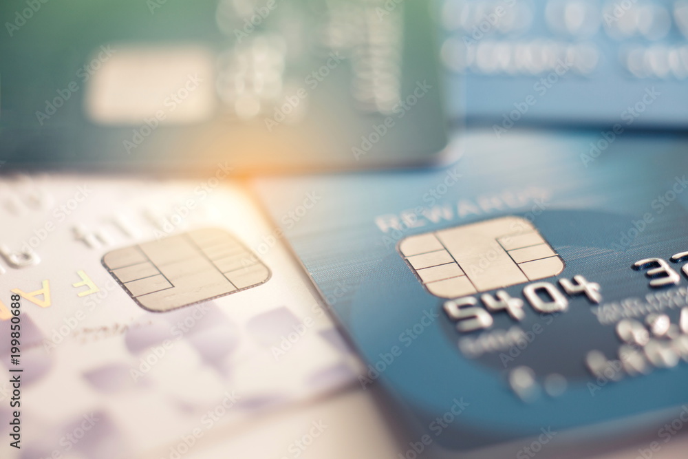 Selective focus microchip on Credit card or Debit card for background.